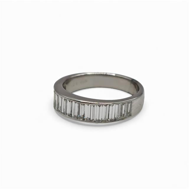 18ct white gold diamond ring with a central sparkling diamond, showcasing elegant design and fine craftsmanship.