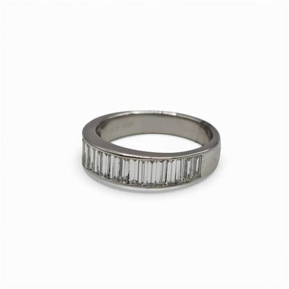 18ct white gold diamond ring with a central sparkling diamond, showcasing elegant design and fine craftsmanship.