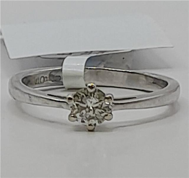 18ct white gold diamond ring in size I 1/2, featuring a sparkling diamond set in a polished band.