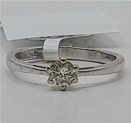 18ct white gold diamond ring in size I 1/2, featuring a sparkling diamond set in a polished band.