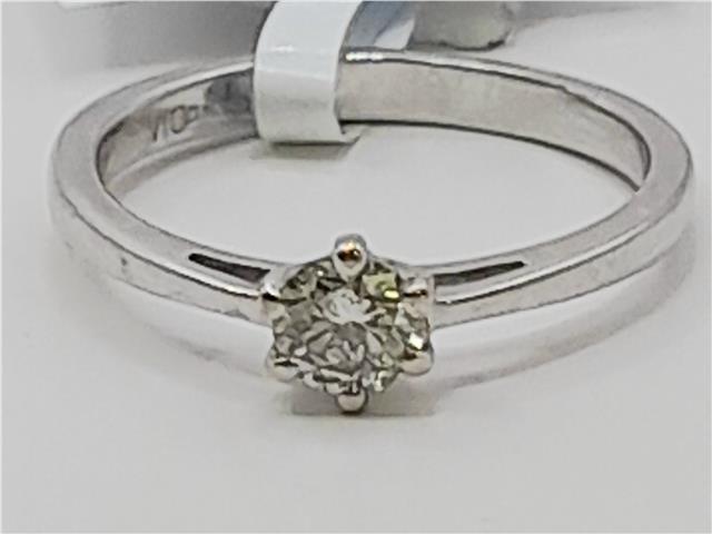 18ct white gold diamond ring in size I 1/2 featuring sparkling diamonds on an elegant band.