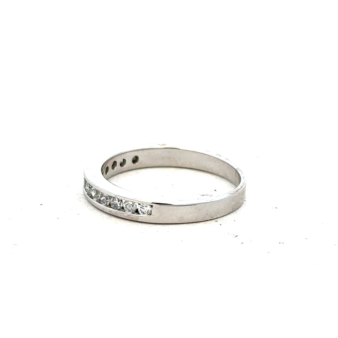 18ct white gold diamond ring in size J with sparkling diamonds, featuring a sleek and elegant design.