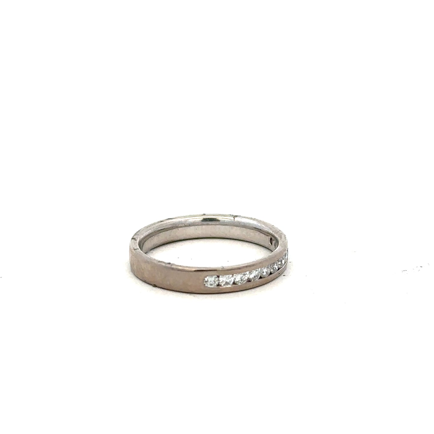 18ct white gold diamond ring in size J1/2 featuring sparkling diamonds on a sleek band.