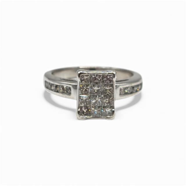 18ct white gold diamond ring in size J1/2, featuring sparkling diamonds and a sleek band, displayed on a neutral background.