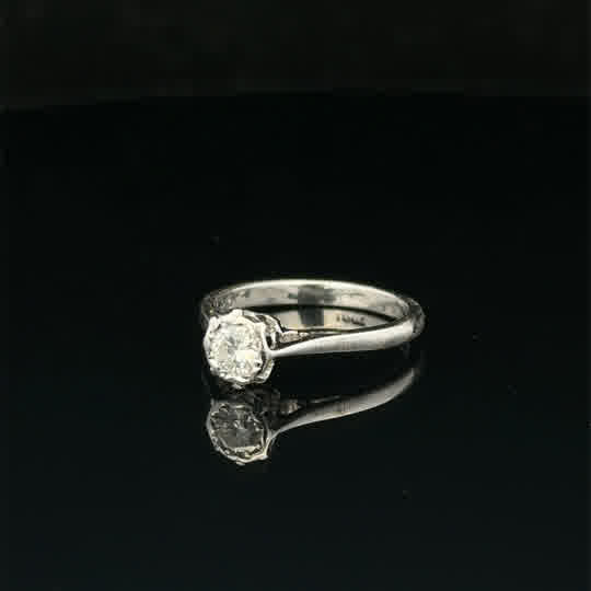 18ct white gold diamond ring in size K with sparkling diamonds, featuring an elegant and classic design.