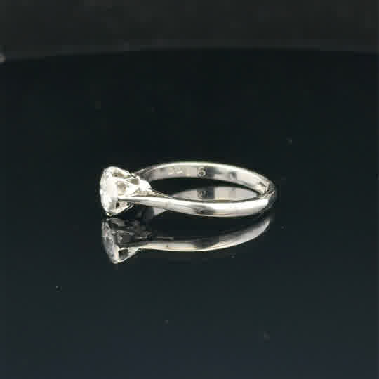 18ct white gold diamond ring size K with sparkling diamonds, showcasing a sleek and elegant jewelry design.