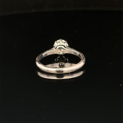 18ct white gold diamond ring in size K with sparkling diamonds, showcased on a plain background.
