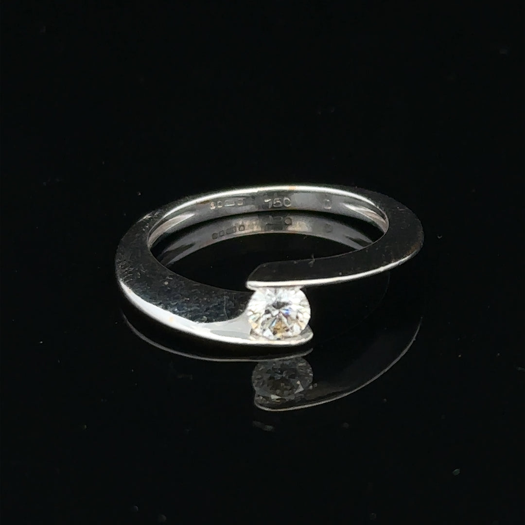 18ct white gold diamond ring size K1/2 featuring sparkling diamonds and a sleek band design.