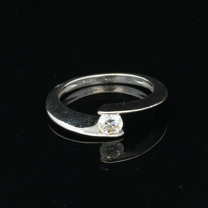 18ct white gold diamond ring size K1/2 featuring sparkling diamonds and a sleek band design.