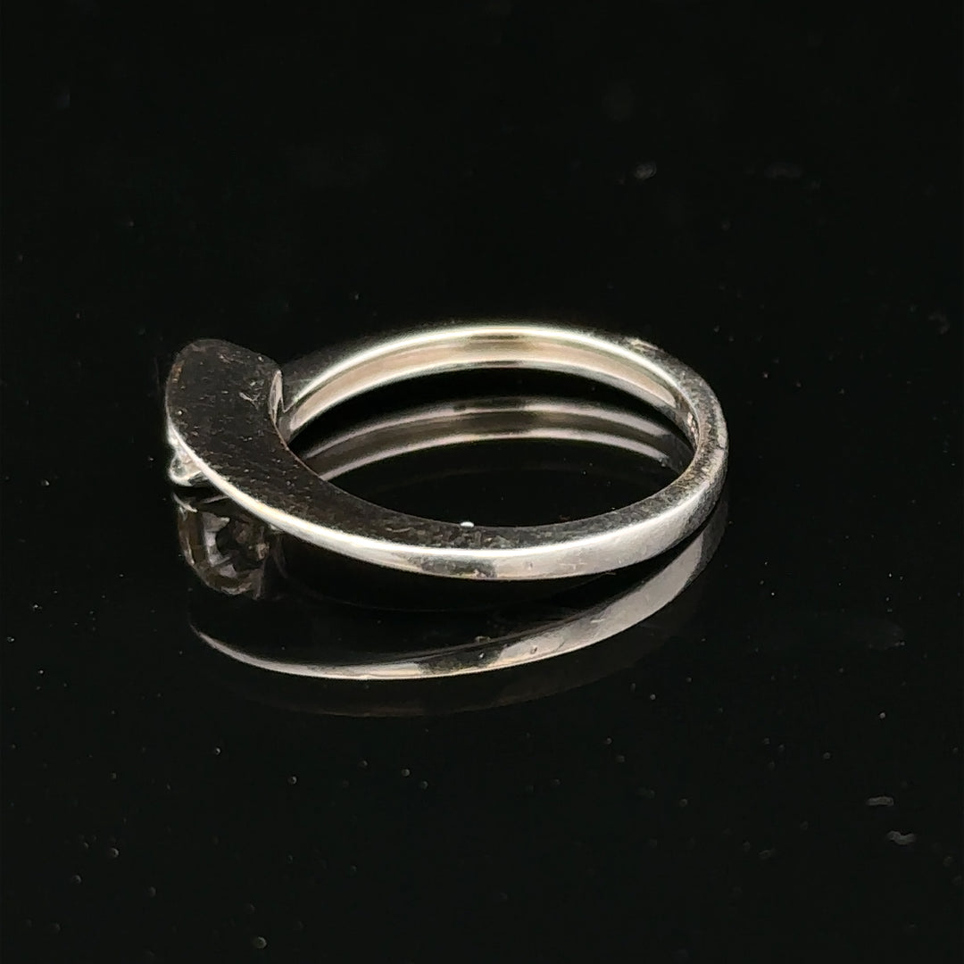 18ct white gold diamond ring size K1/2 with sparkling diamonds, showcasing elegant jewelry craftsmanship.
