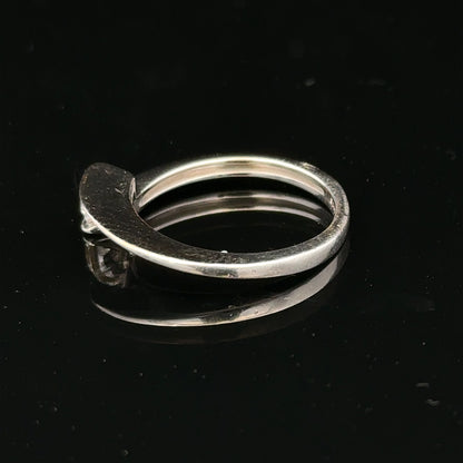 18ct white gold diamond ring size K1/2 with sparkling diamonds, showcasing elegant jewelry craftsmanship.