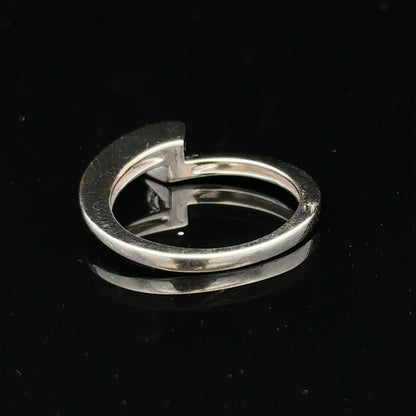 18ct white gold diamond ring in size K1/2 with sparkling diamonds, showcasing an elegant and classic jewelry design.