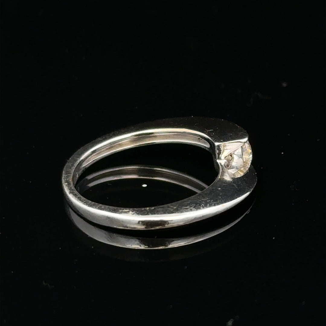 18ct white gold diamond ring in size K1/2 with sparkling diamonds, showcasing elegant jewelry craftsmanship.