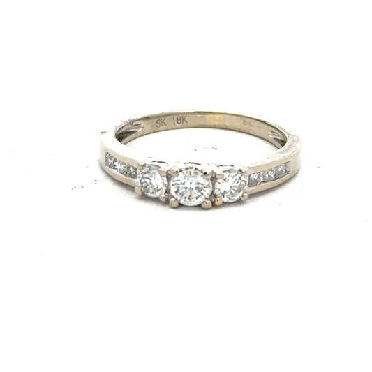 18ct white gold diamond ring in size L with sparkling diamonds, showcasing elegant jewelry craftsmanship.