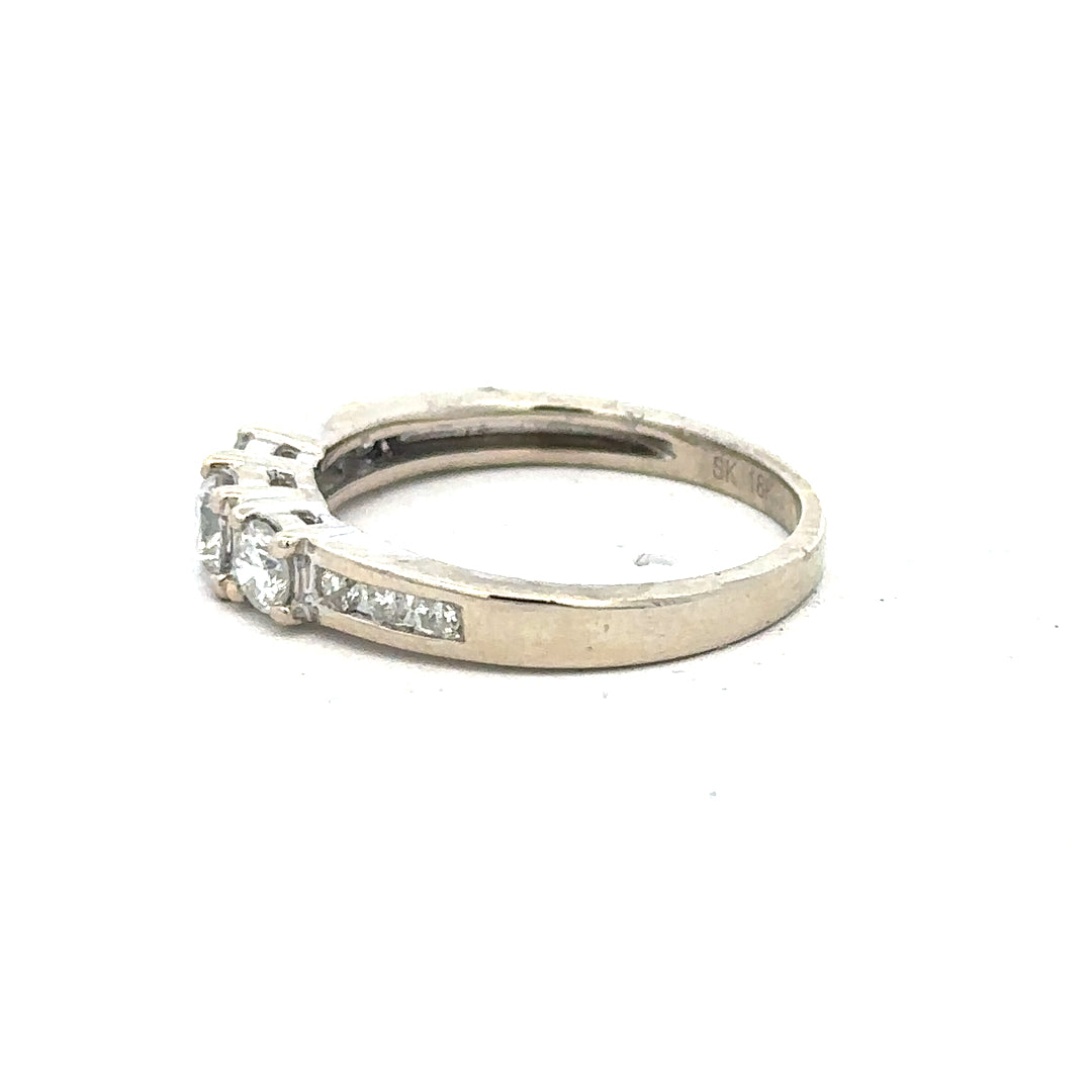 18ct white gold diamond ring in size L with sparkling diamonds, showcasing elegant craftsmanship and fine jewelry design.