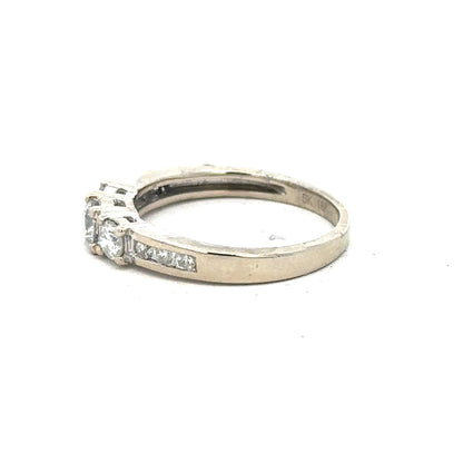 18ct white gold diamond ring in size L with sparkling diamonds, showcasing elegant craftsmanship and fine jewelry design.
