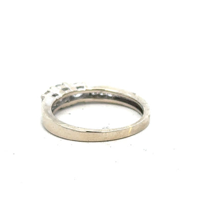18ct white gold diamond ring in size L with sparkling diamonds, showcasing elegant craftsmanship and fine jewelry details.