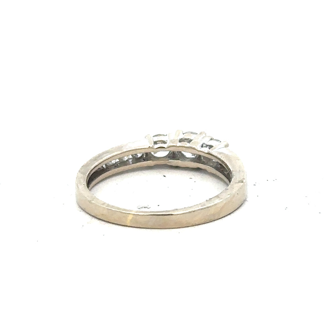 18ct white gold diamond ring in size L, featuring a sparkling diamond setting and elegant design.