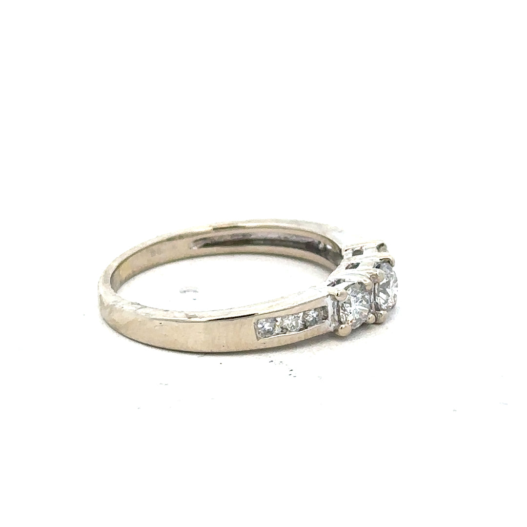 18ct white gold diamond ring in size L with sparkling diamonds, showcasing fine craftsmanship and elegant design.