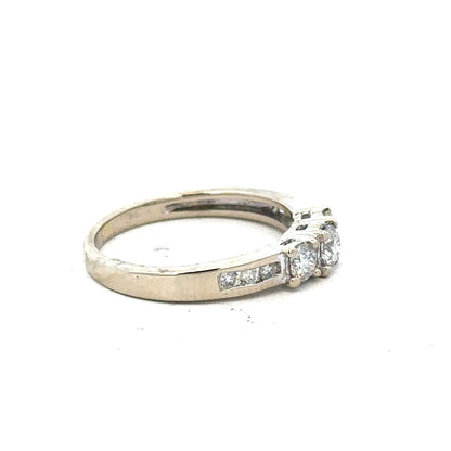 18ct white gold diamond ring in size L with sparkling diamonds, showcasing fine craftsmanship and elegant design.