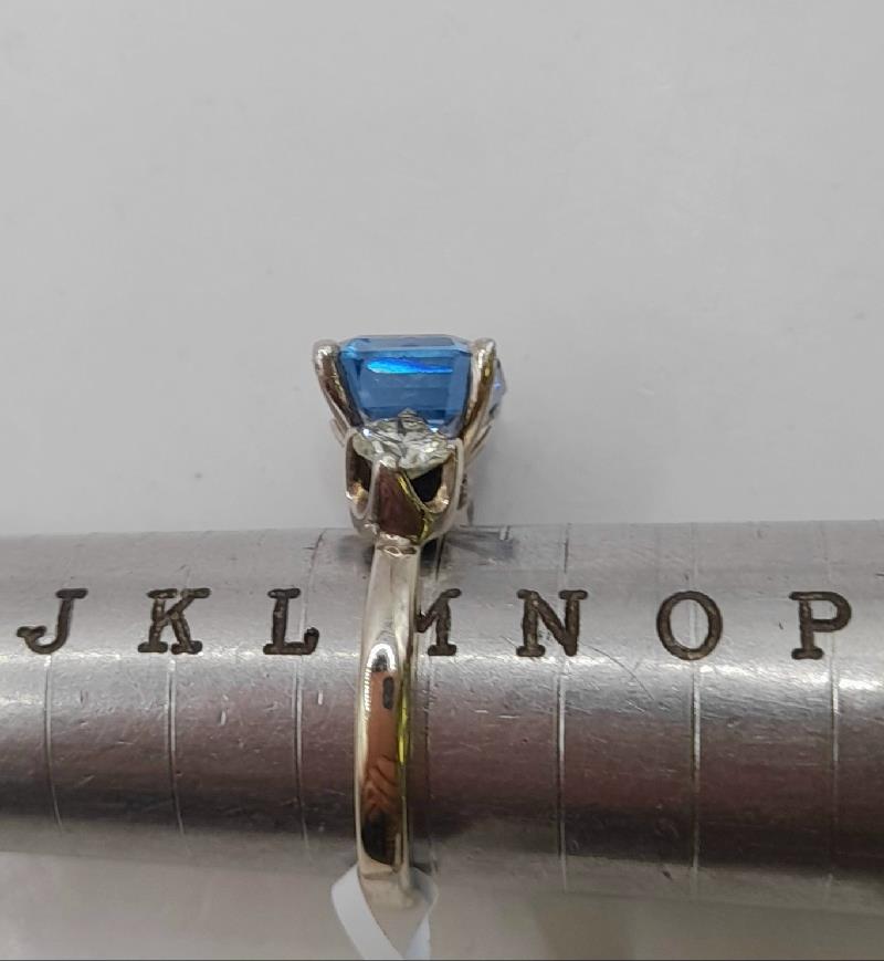 18ct white gold diamond ring in size M with sparkling diamonds, elegant jewelry piece with detailed craftsmanship.