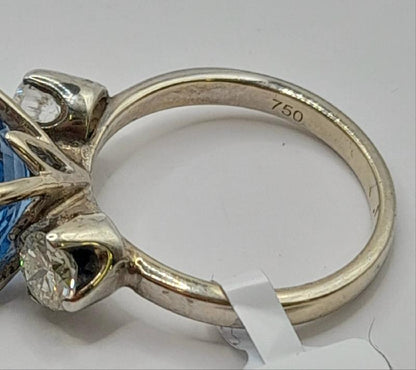 18ct white gold diamond ring in size M featuring a sparkling diamond, crafted with elegant design and fine craftsmanship.