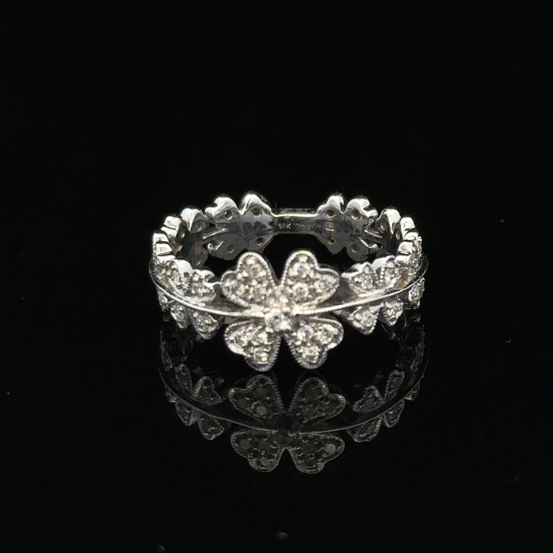 18ct white gold diamond ring in size N with a sparkling central diamond and elegant band design.