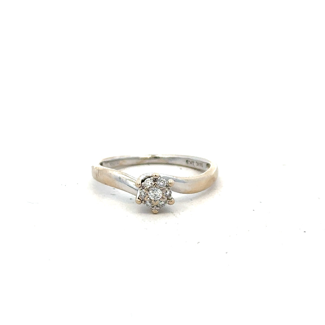 18ct white gold diamond ring in size N with sparkling diamonds, showcasing elegant craftsmanship and a sleek band design.