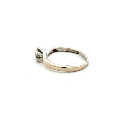 18ct white gold diamond ring in size N featuring a sparkling central diamond and delicate band design.