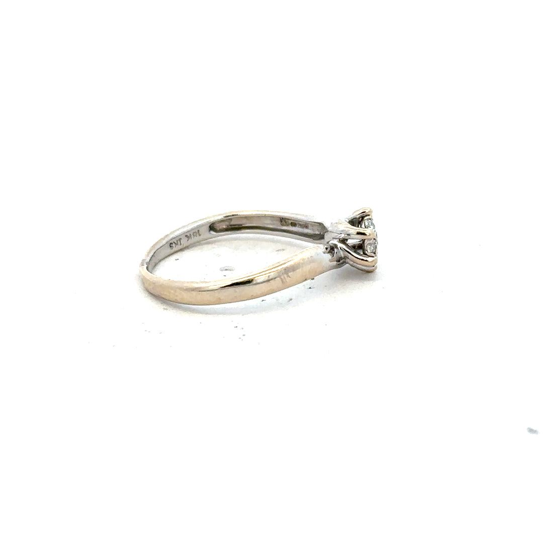 18ct white gold diamond ring in size N with sparkling diamonds, showcasing elegant jewelry design.