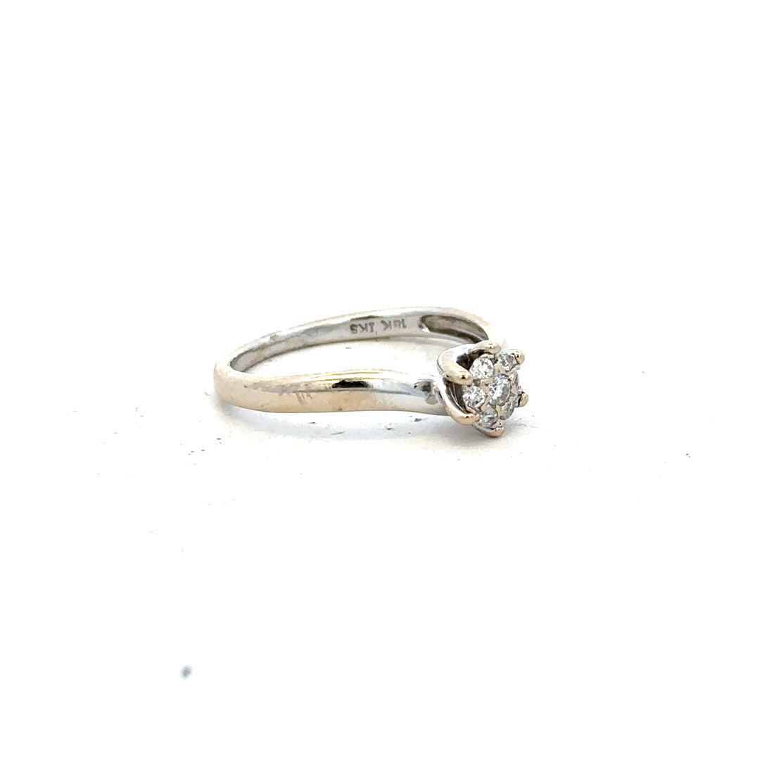 18ct white gold diamond ring in size N with sparkling diamonds, featuring a sleek and elegant design.