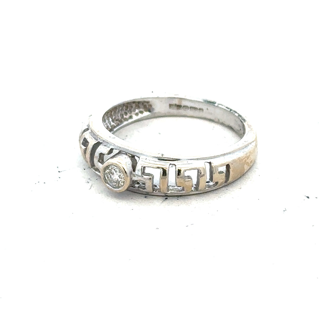 18ct white gold diamond ring size N with sparkling diamonds, showcasing elegant craftsmanship and a polished finish.