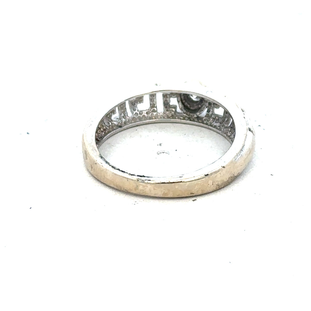 18ct white gold diamond ring in size N with sparkling diamonds, showcased on a neutral background.