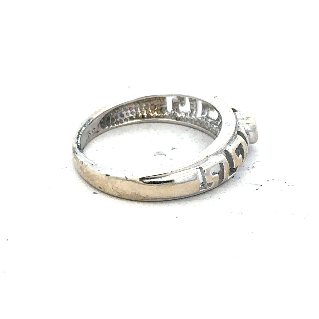 18ct white gold diamond ring size N with sparkling diamonds, elegant jewelry piece with a polished band and intricate design.