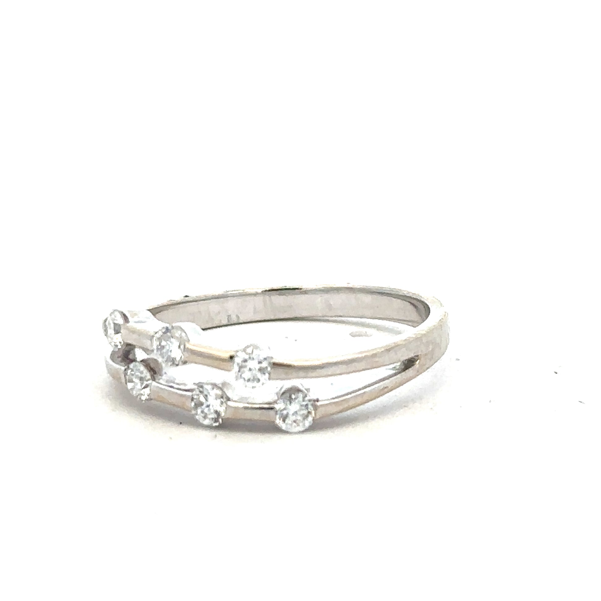 18ct white gold diamond ring in size O with sparkling diamonds, showcasing elegant jewelry craftsmanship.