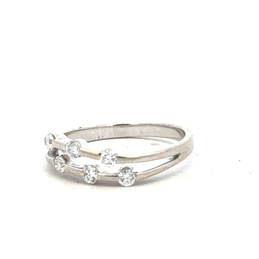 18ct white gold diamond ring in size O with sparkling diamonds, showcasing elegant jewelry craftsmanship.