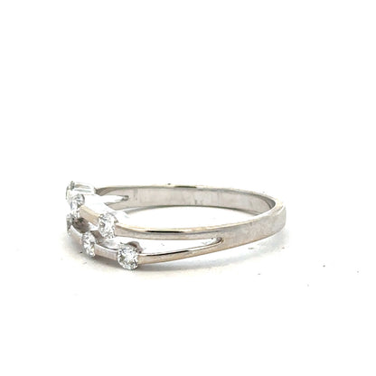 18ct white gold diamond ring in size O with sparkling diamonds, elegant jewelry piece.