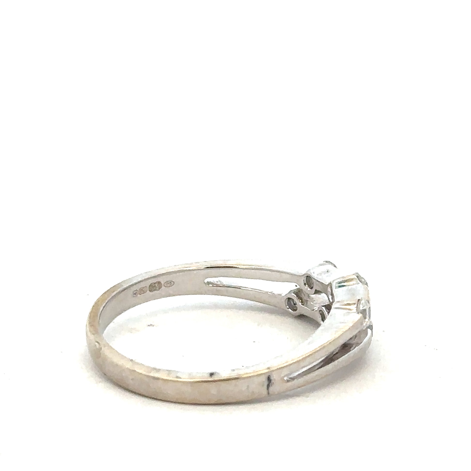 18ct white gold diamond ring size O with sparkling diamonds, showcasing a sleek and elegant jewelry design.