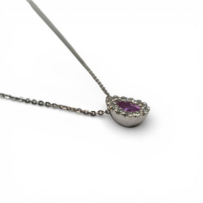 18ct white gold pendant with pink sapphire and diamonds, showcasing a delicate and elegant jewelry design.