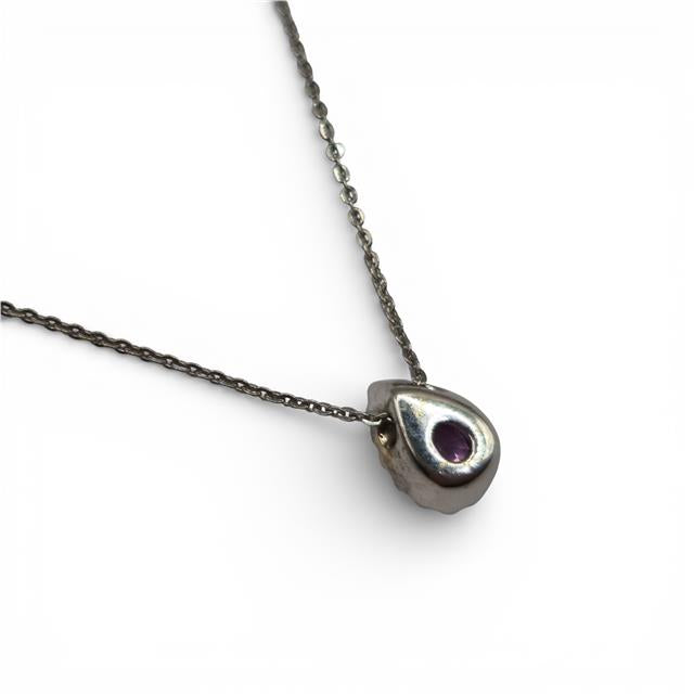 18ct white gold pendant with pink sapphire and diamonds, showcasing a delicate design with sparkling gemstones.