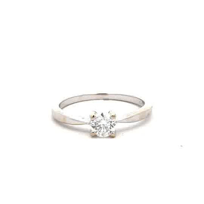 18ct white gold ring size J1/2 with a smooth band, unbranded jewelry piece, shown close-up on a plain background.