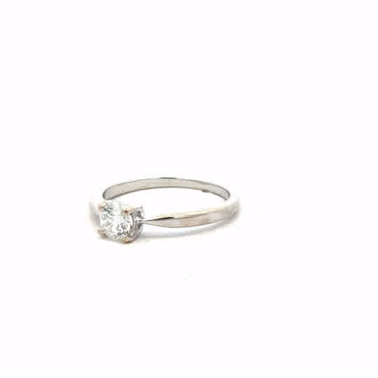 18ct white gold ring size J1/2 with a smooth band, unbranded jewelry, shown on a plain background.