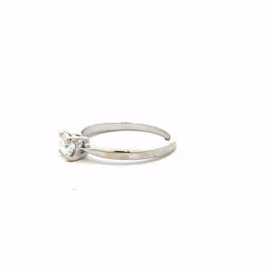 18ct white gold ring size J1/2 with a smooth polished band, unbranded jewelry, shown from a side angle.