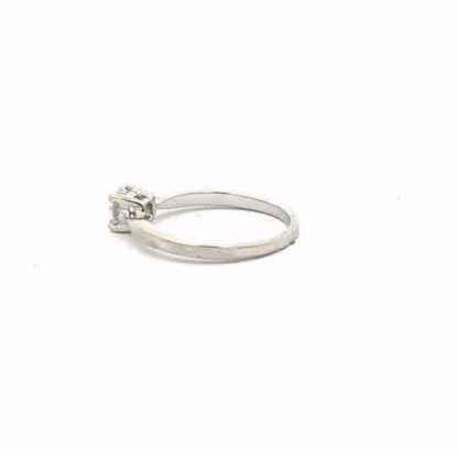 18ct white gold ring in size J1/2 with a smooth band, showcased on a plain background.