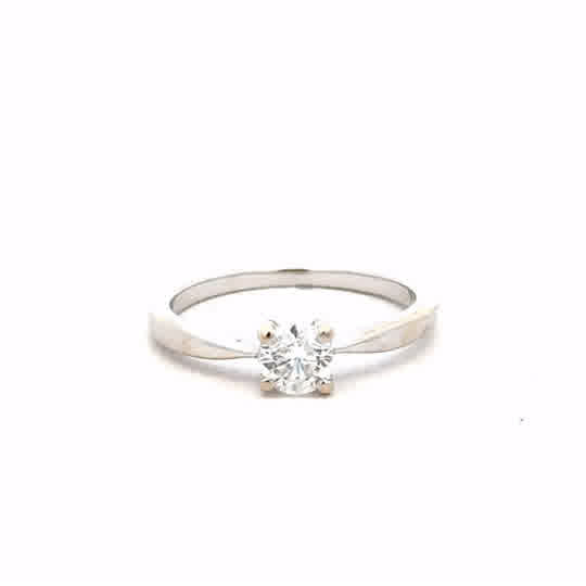 18ct white gold ring in size J1/2 with a simple band design, displayed on a neutral background.