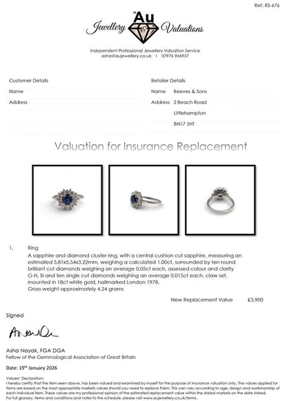 18ct white gold sapphire and diamond ring featuring a central sapphire gemstone with surrounding diamonds.