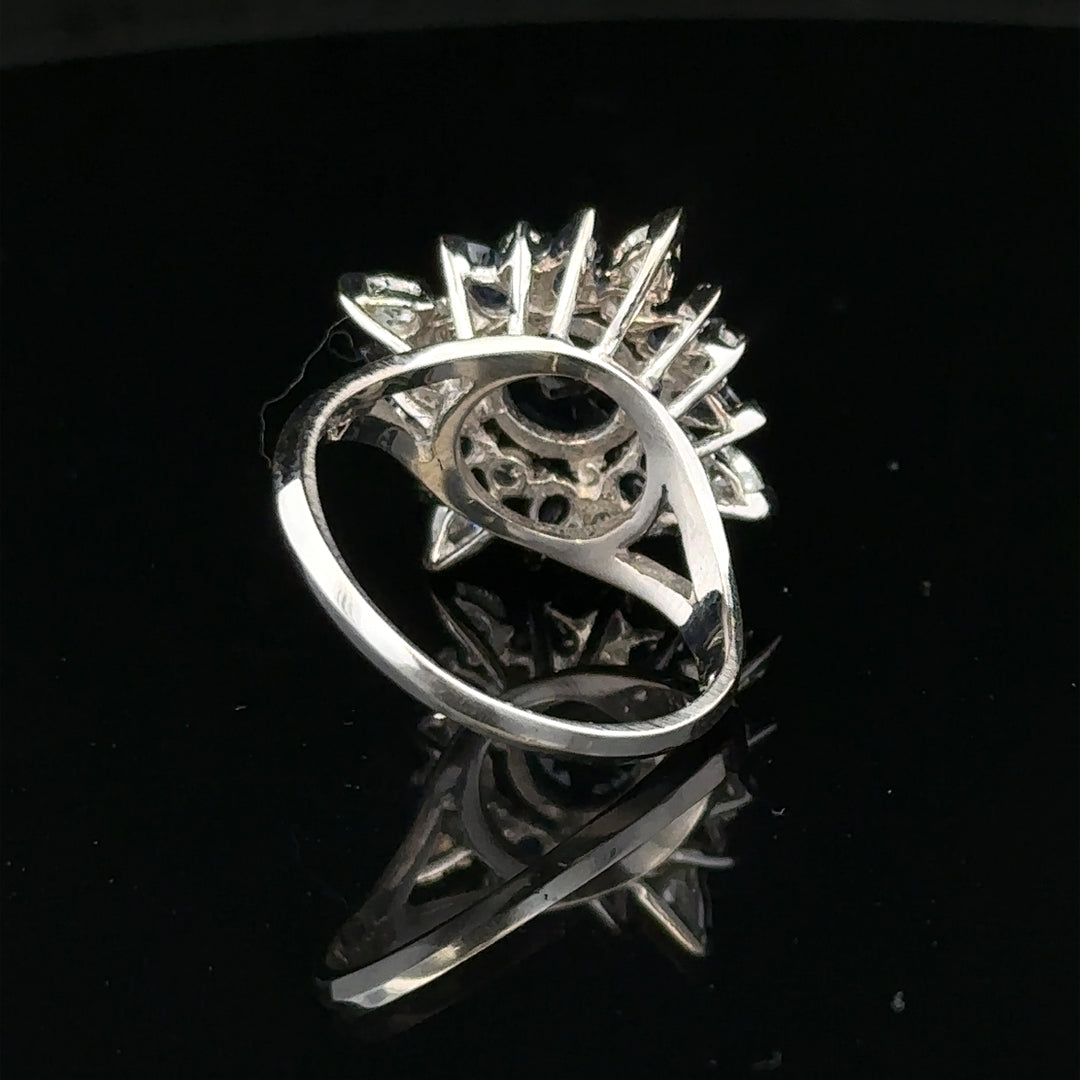18ct white gold sapphire and diamond ring in size N1/2, featuring a stunning central sapphire with sparkling diamonds.