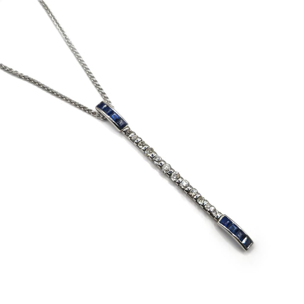 18ct white gold sapphire and diamond pendant with matching white gold chain, elegant jewelry piece.