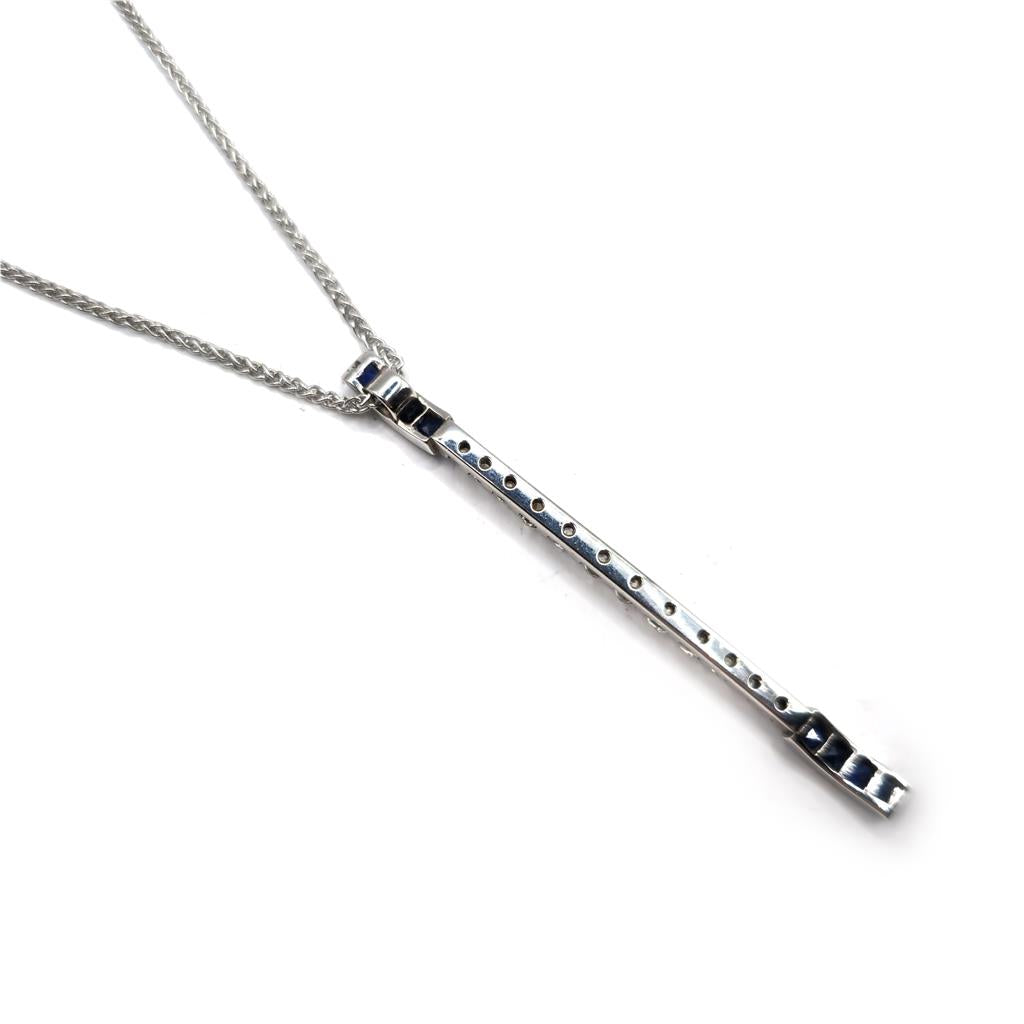 18ct white gold sapphire and diamond pendant with matching white gold chain, elegant jewelry piece.