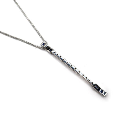 18ct white gold sapphire and diamond pendant with matching white gold chain, elegant jewelry piece.
